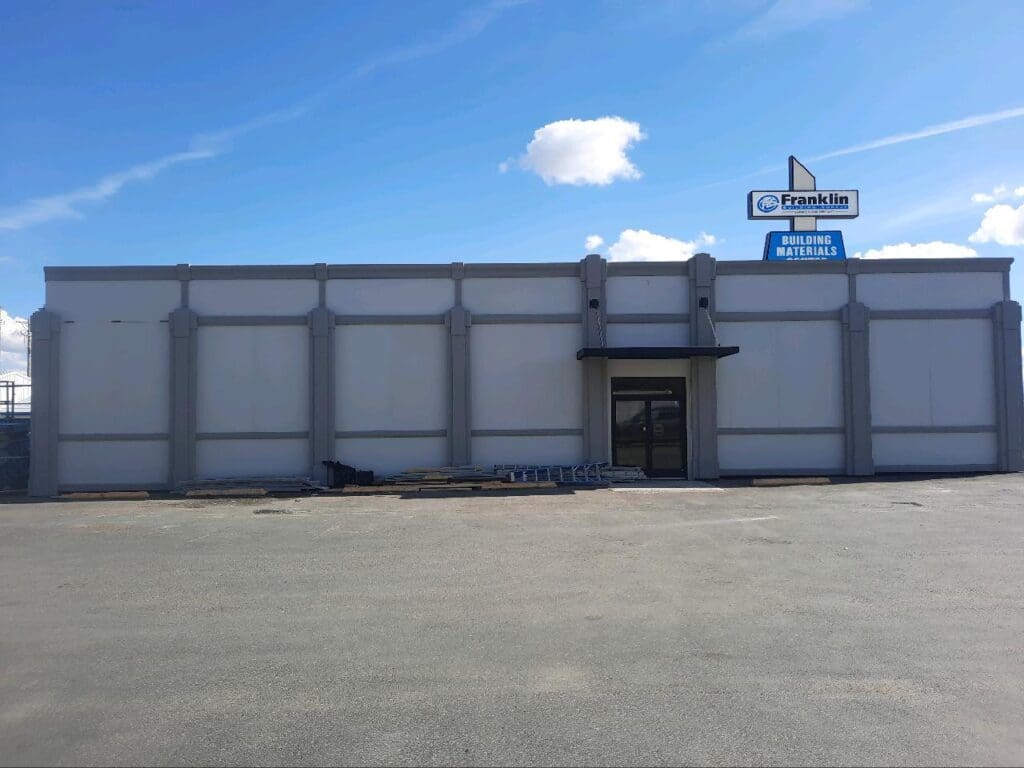 Prefabricated stucco insulated siding panels showcasing durable and energy-efficient construction solutions. These panels are designed for quick assembly, reducing on-site labor and costs, while providing a sleek, finished look for exterior applications.