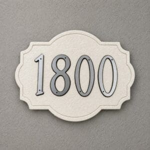 Colonial style address plaque by SnapTight Products mounted on house exterior and weather-resistant.