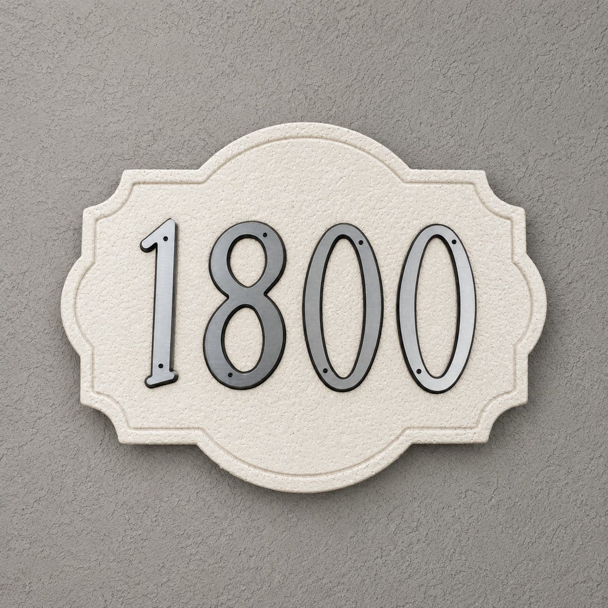 Colonial style address plaque by SnapTight Products mounted on house exterior and weather-resistant.