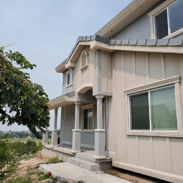 Board and batten style wall panels featuring a classic, textured design for a timeless aesthetic. These prefabricated panels offer easy installation, enhanced durability, and a sleek, vertical profile, perfect for both modern and traditional building projects.