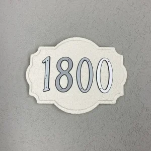 Colonial style address plaque by SnapTight Products mounted on house exterior, customizable and weather-resistant