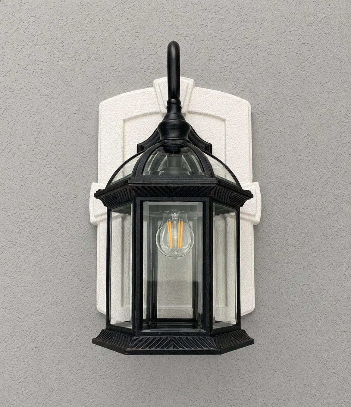 SnapTight Colonial Light Mounting Block Trim installed on a home exterior, providing a clean, weather-resistant mounting surface for exterior lighting fixtures.