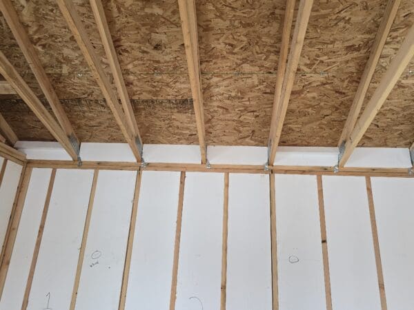 Insulated non-vented truss block designed for energy-efficient roofing systems, featuring durable foam construction for thermal protection and structural support.