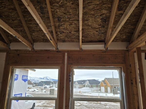 Insulated non-vented truss block designed for energy-efficient roofing systems, featuring durable foam construction for thermal protection and structural support.