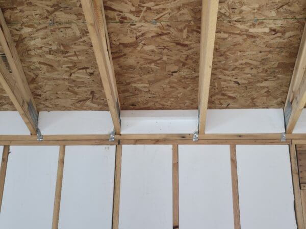 Insulated non-vented truss block designed for energy-efficient roofing systems, featuring durable foam construction for thermal protection and structural support.