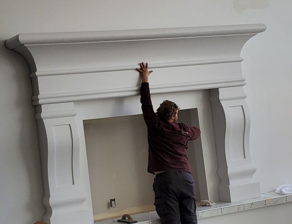 Realistic faux fireplace mantle by SnapTight Products, crafted from lightweight EPS for decorative charm and easy installation.