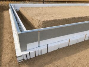 FasTrax footing and stem wall forms with built-in insulation designed for fast, stay-in-place foundation construction