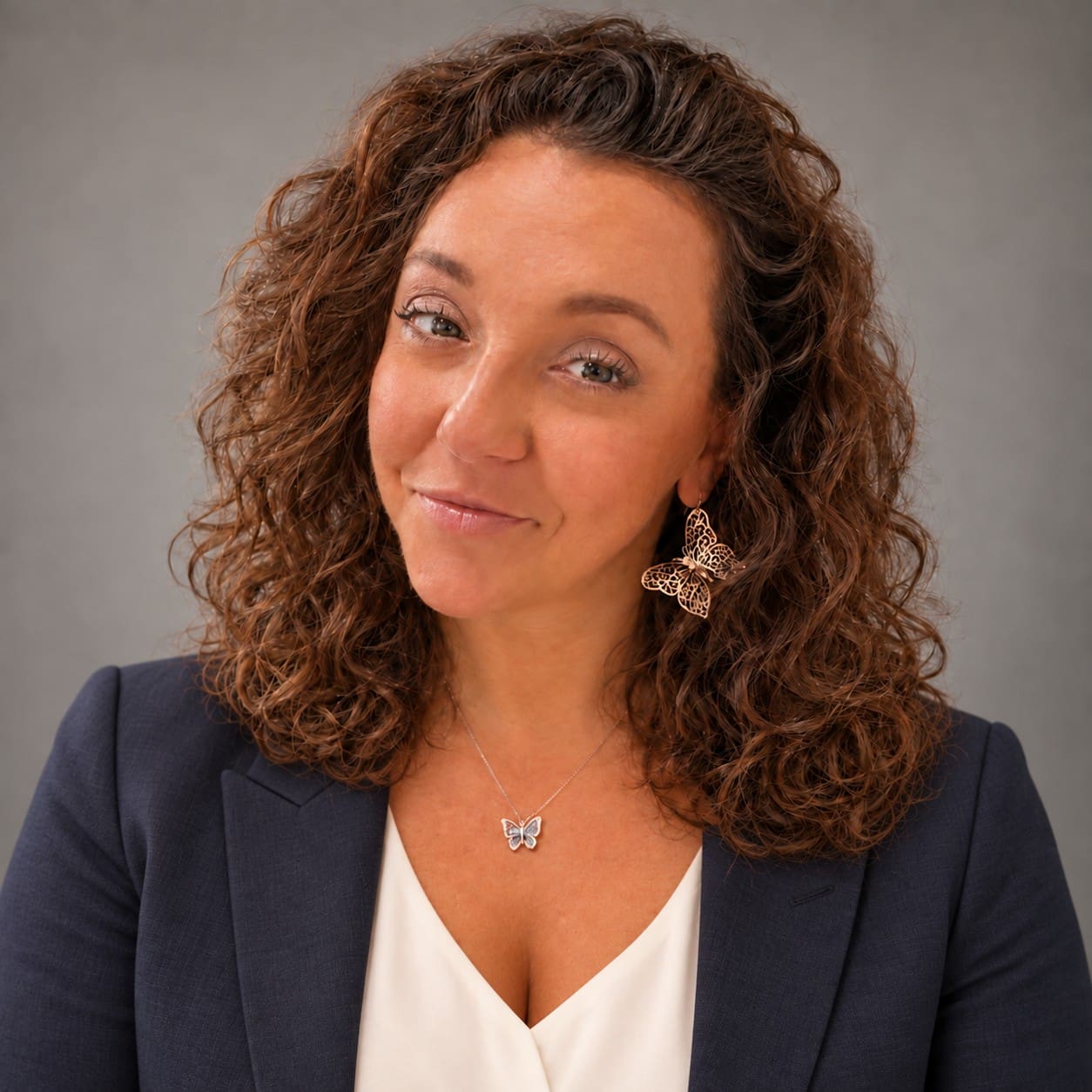Amy's polished charcoal blazer headshot