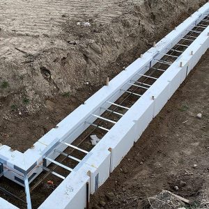 SnapTight Products FasTrax Footing Form – insulated, easy-to-install system for precise concrete footing pours and faster jobsite setup.